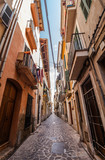 Fototapeta Uliczki - Narrow street in the city of Palma de Majorca