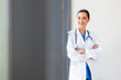 attractive young female medical doctor portrait in office