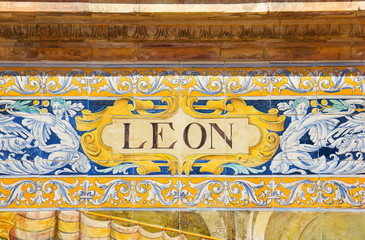 Poster - Leon sign over a mosaic wall