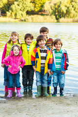 Wall Mural - Kids in rubber boots