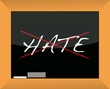 blackboard with the word hate cross out