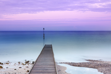 Wall Mural - Jetty reaching into the silent sea