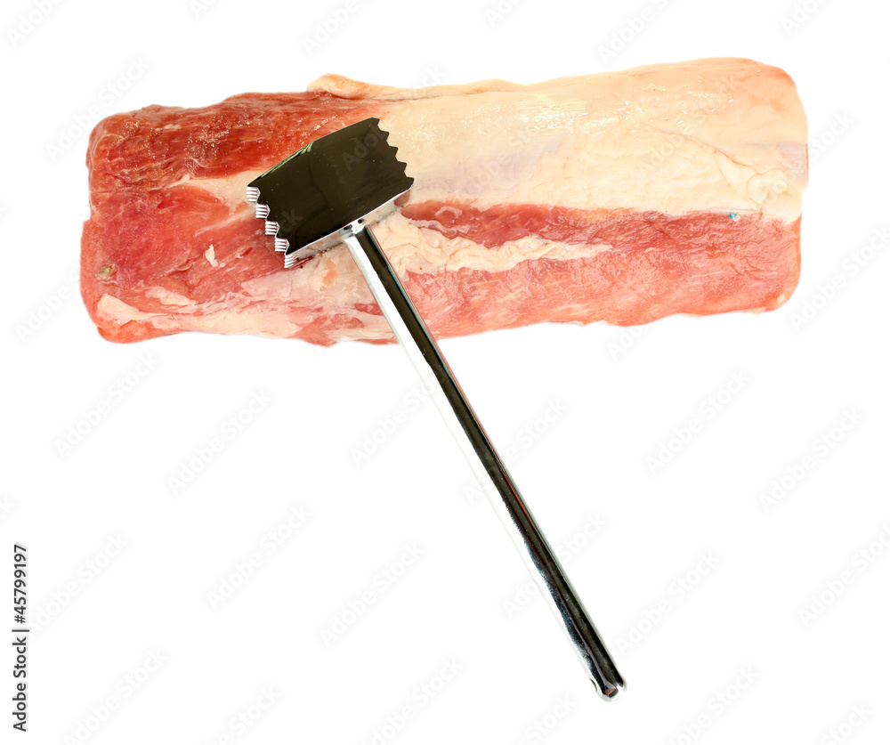 raw pork with a meat hammer isolated on white