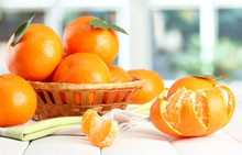 Tangerines With Leaves In A Beautiful Basket,