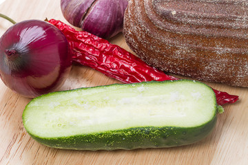 Canvas Print - Half of cucumber with salt