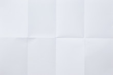 White Sheet Of Paper Folded In Eight