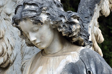 Statue Of An Angel At The Cemetery