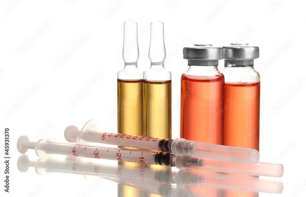 medical ampules and syringes, isolated on white