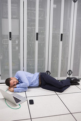 Poster - Man napping in data center