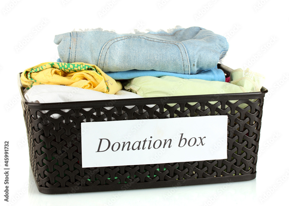 Donation box with clothing isolated on white