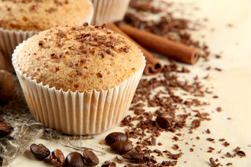 Wall Mural - tasty muffin cakes with chocolate, spices and coffee seeds,