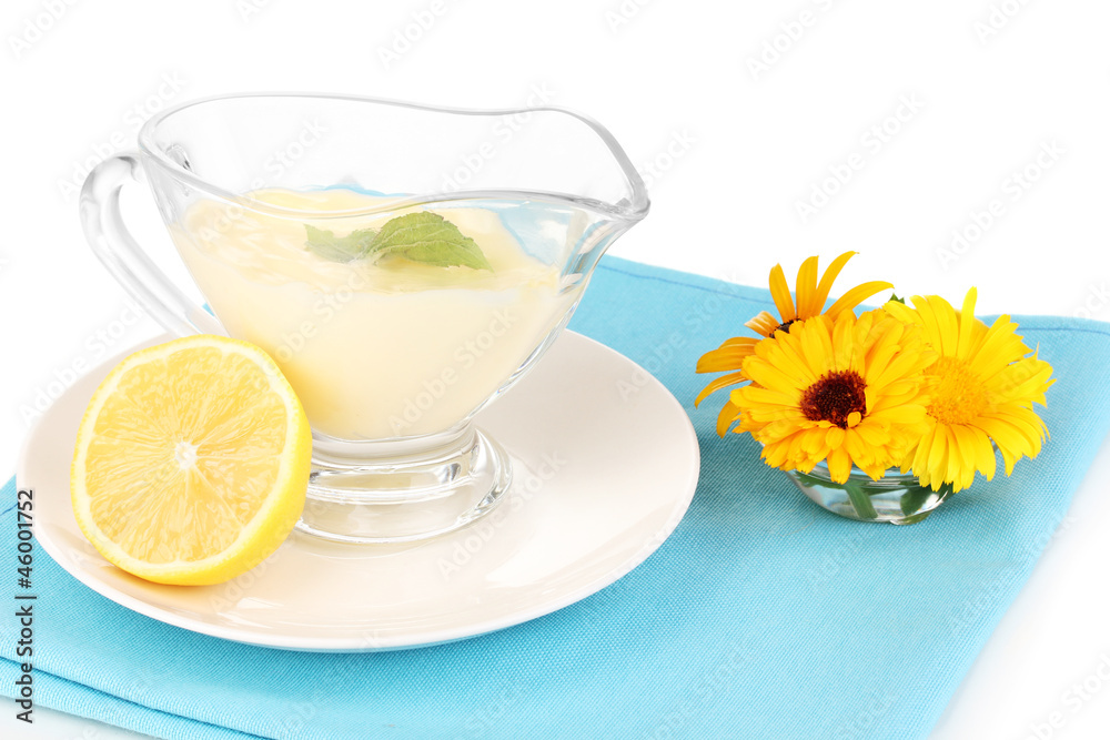 Mayonnaise in bowl on napkin isolated on white