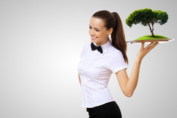 Wall Mural - waitress with a tray with green symbol on it