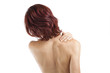 redheaded woman with pain in her back