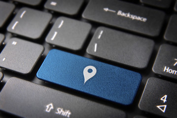 Wall Mural - blue geo location keyboard key, technology background