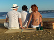 woman cheating on boyfriend by sea shore