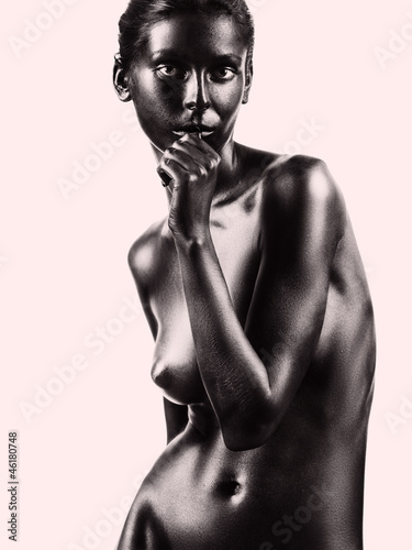Fototapeta na wymiar artistic nude beautiful woman beige background