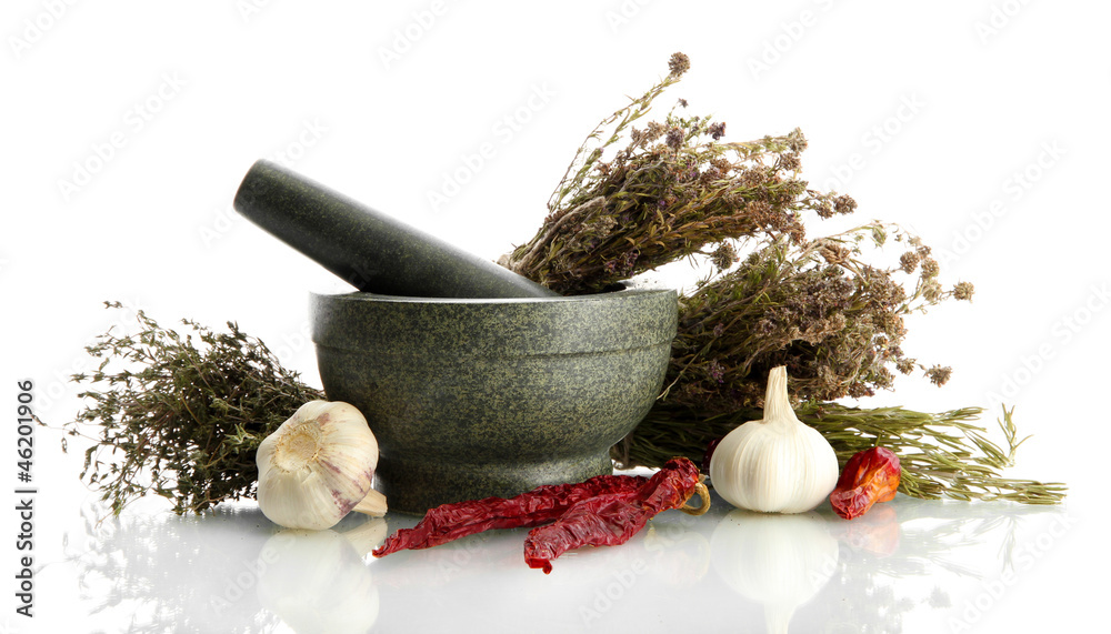 dried herbs in mortar and vegetables, isolatrd on white