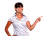 © pablocalvog - Charming young woman pointing her left