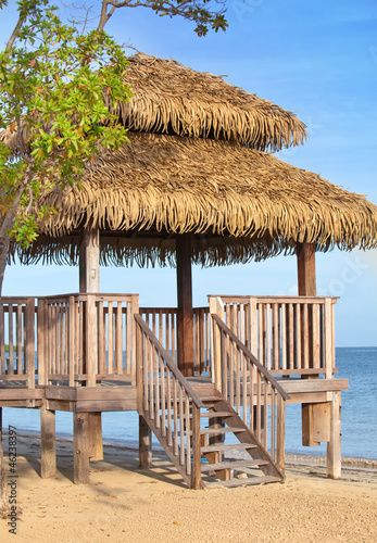 Naklejka na drzwi Pavilion in natural style on a beach...