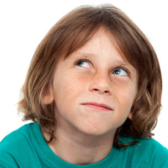 Close up of boy with wondering face expression.