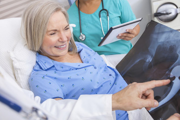 Wall Mural - Happy Senior Woman Patient in Hospital Bed