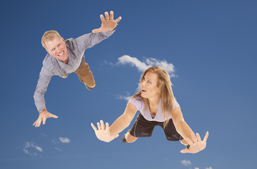 two people sky diving