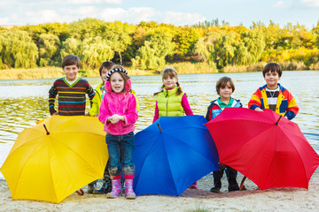 Wall Mural - Kids with umbrellas