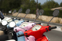 A Line Of Mopeds/scooters