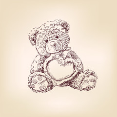 illustration of teddy bear with heart.