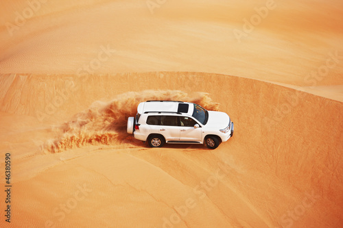 Fototapeta na wymiar 4 by 4 dune bashing is a popular sport of the Arabian desert