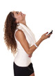 © jeffreyjcoleman - Beautiful woman laughs at her cell phone.