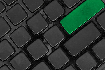 keyboard close up,top view and green button