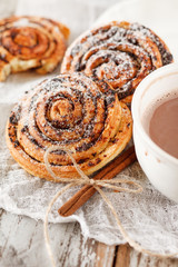 Wall Mural - cinnamon rolls with cocoa