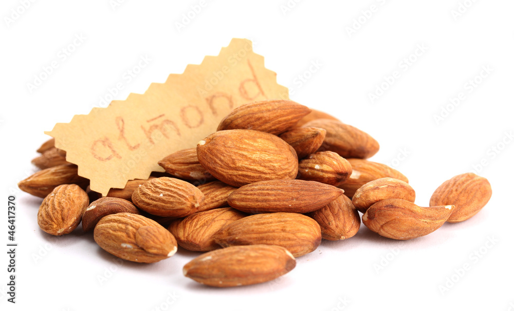 tasty almonds nuts, isolated on white