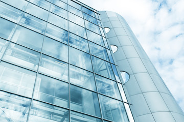 View to steel blue background of glass high rise building