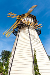 white wooden windmill