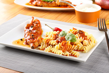 Wall Mural - Fusilli pasta with pork and tomato sauce