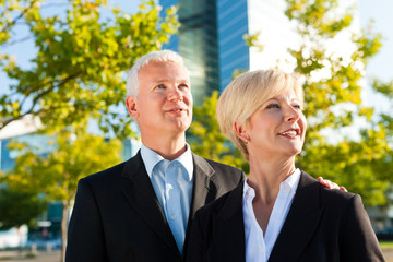 Business people in a park outdoors