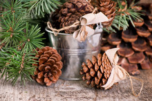 Christmas Composition With Pine Cones In A Bucket