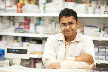 Pharmacy chemist woman in drugstore