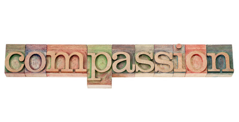 Wall Mural - compassion word in wood type