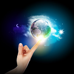 Wall Mural - hand touching the earth