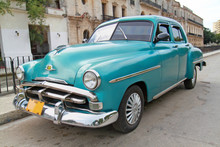 Classic Blue Plymouth In Havana. Cuba.