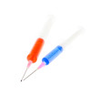 Syringes with blue and red liquid
