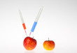 Apples and Syringes with red and blue liquid