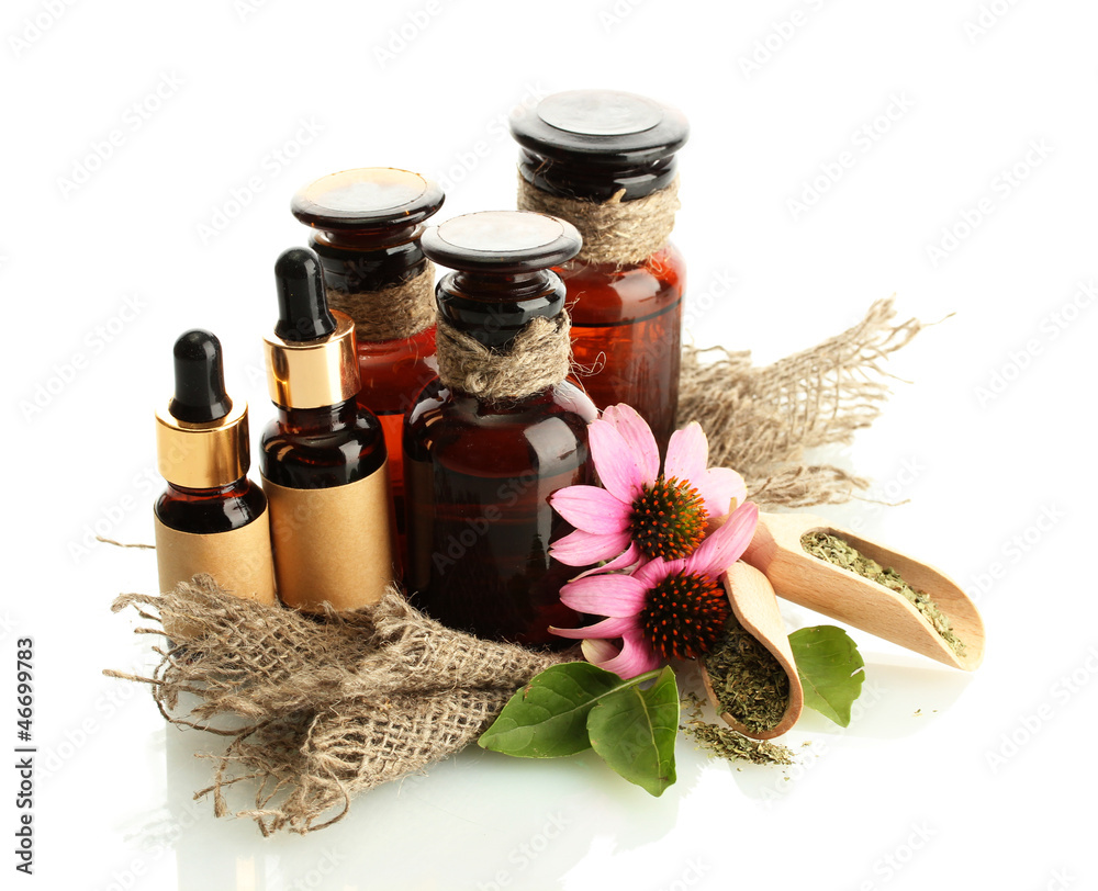 medicine bottles with purple echinacea , isolated on white