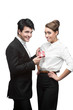 © photo-nuke - young happy business people giving red gift