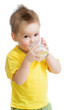 Little kid or child drinking dairy product from glass isolated o