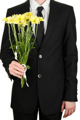 Wall Mural - man holding flowers close-up